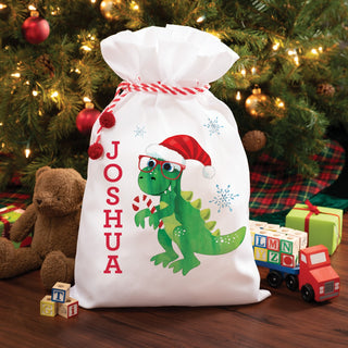 Green dino with santa hat santa sack with name