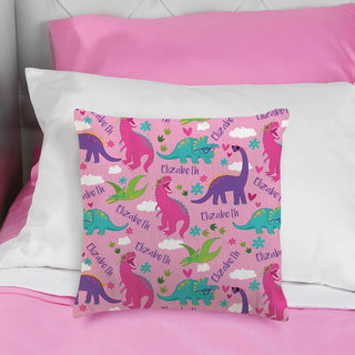 Colorful dinosaurs throw pillow with name