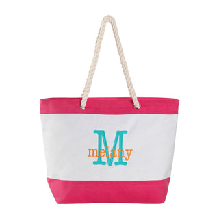Pink and white canvas beach tote personalized in fun colors with name and initial summertime gift