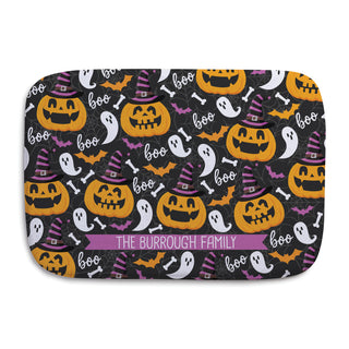 Hand towel featuring a spooky Halloween pumpkin and ghost pattern, personalized with a name for a festive touch.