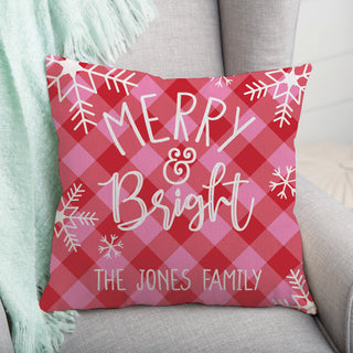 14" throw pillow featuring a "Merry & Bright" message with a pink and red check pattern, personalized with a name.