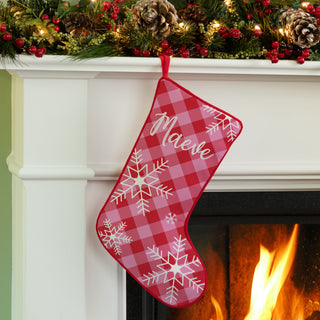 Christmas stocking with "Merry & Bright" message, pink and red check pattern, and red trim, personalized with a name.