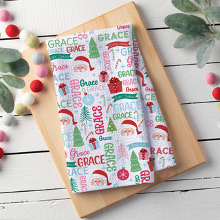 Waffle tea towel featuring a jolly Santa design with a personalized name pattern for a festive and custom touch.