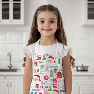 Youth apron featuring a jolly Santa design, personalized with a name to add to the festive design.