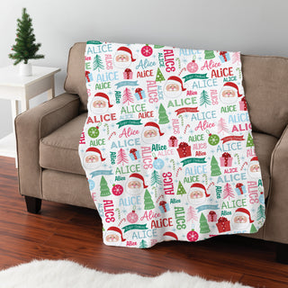 Fuzzy blanket with a jolly Santa design and personalized name pattern for a festive touch.