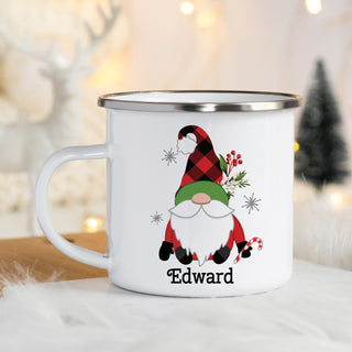 Camp mug featuring a red gnome with a red and black check pattern hat with a green brim personalized with a name at the bottom