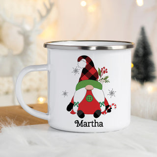 Camp mug featuring a red gnome with a red and black check pattern hat with a green brim and a green button personalized with a name at the bottom